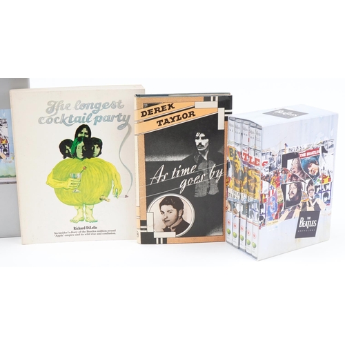 637 - The Beatles memorabilia including The Beatles Singles record Collection 1962-1970 and hardback books