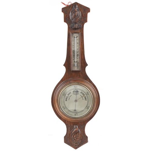 234 - Carved oak wall barometer with silvered dial, 73cm high