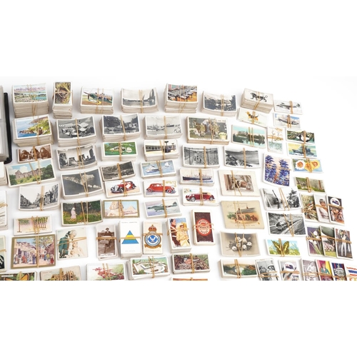 2305 - Extensive collection of early 20th century and later cigarette cards and tea cards, some arranged in... 