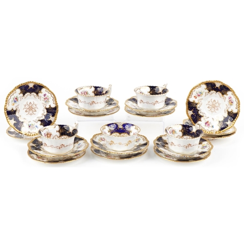 115 - Edwardian Coalport teaware hand painted and gilded with flowers