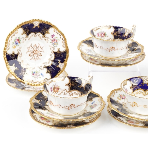 115 - Edwardian Coalport teaware hand painted and gilded with flowers