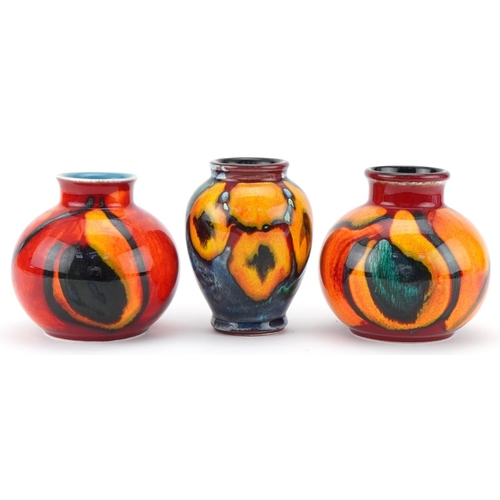 511 - Three Poole Aegean vases, the largest 10.5cm high