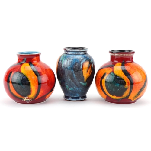 511 - Three Poole Aegean vases, the largest 10.5cm high