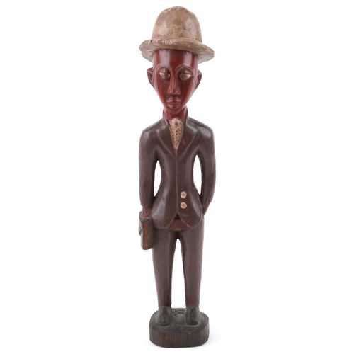 371 - Carved wood figure, possibly by Yoruba Thomas Ona, 50cm high