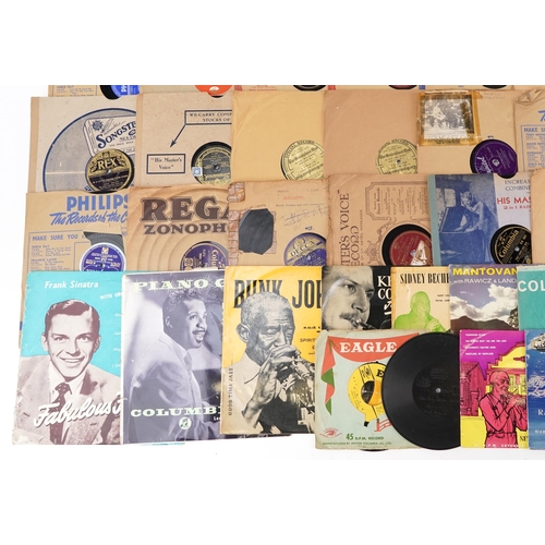 636 - Vinyl LP records and 45rpm records including Billie Holiday, Bob Dylan, Nat King Cole and Frank Sina... 