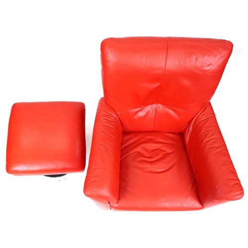 735 - Modern red leather revolving armchair with matching footstool, both on chromium plated circular base... 