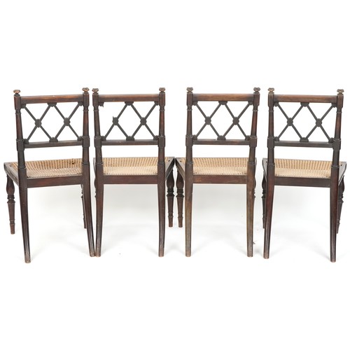 563 - Set of four early 19th century mahogany framed dining chairs with lattice backs above cane seats rai... 