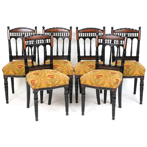 621 - Set of six late Victorian Aesthetic Movement ebonised dining chairs with overstuffed floral upholste... 