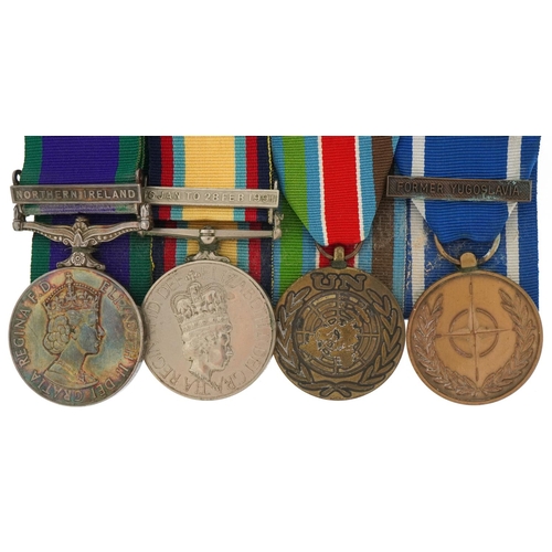 2570 - Four military medals with three bars and ribbons awarded to 24747312 LCPL L.TAYLOR.REME