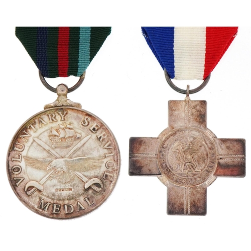 2618 - Two silver military interest medals with boxes for General Service and Voluntary Service awarded to ... 