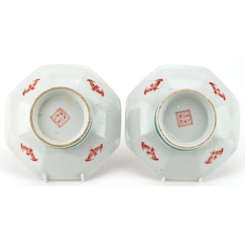 1414 - Pair of Chinese octagonal footed bowls hand painted with dragons and phoenixes, 18cm in diameter