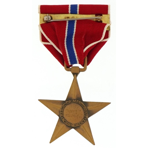 2571 - American military bronze Star medal with bar and ribbon awarded to James G Smithart, housed in a pre... 