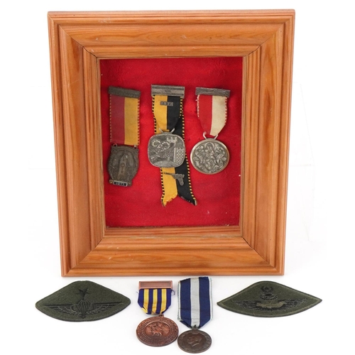 2573 - Militaria including Parachute cloth patches and Air Archery medals