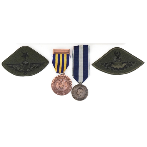 2573 - Militaria including Parachute cloth patches and Air Archery medals