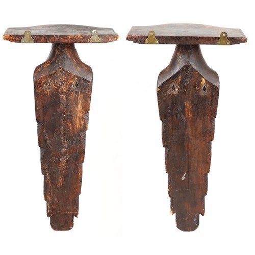 573 - Pair of Arts & Crafts carved walnut wall brackets in the form of birds, 65cm H x 34cm W x 23cm D