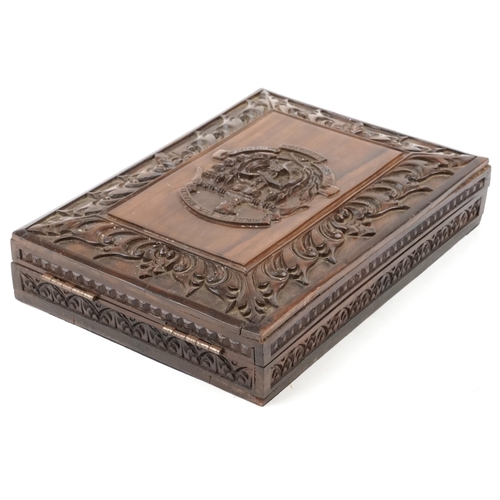 285 - 20th century Indonesian carved softwood cigar box with military coat of arms, 88cm H x 24cm W x 33cm... 