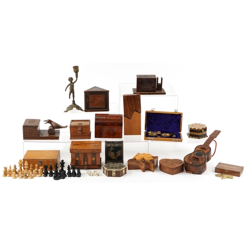 1127 - Small collection of novelty carved wooden cigarette dispensers, boxes and a chess set