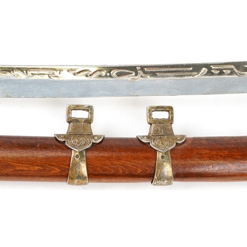 2728 - Japanese Katana, Late 20th century, the curved single edged blade with a pierced oval guard