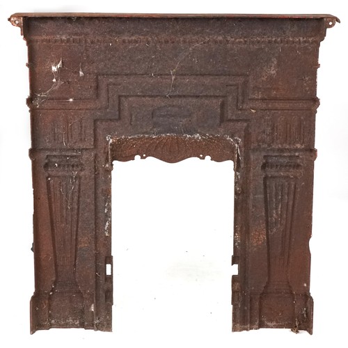 649 - 19th century cast iron fire surround with fluted columns, 108cm high x 105cm wide