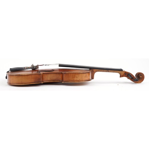 1434 - Old wooden violin with bow and protective carry case, the violin back 14.5 inches in length