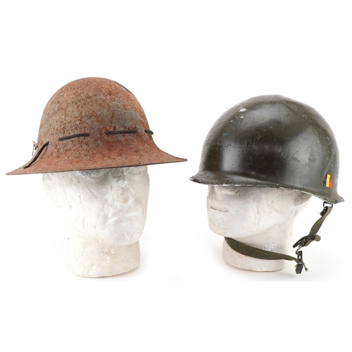 2639 - Two military interest tin helmets, one with German decal