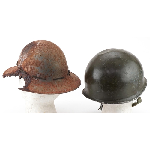 2639 - Two military interest tin helmets, one with German decal