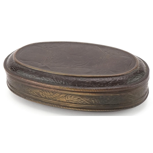 123 - 18th century Flemish oval brass tobacco box with engraved decoration, 14cm wide