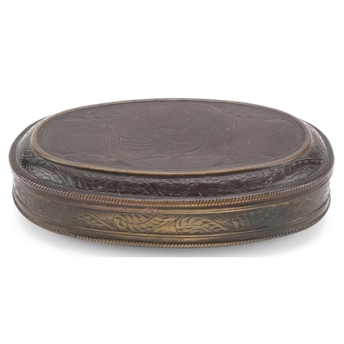 123 - 18th century Flemish oval brass tobacco box with engraved decoration, 14cm wide