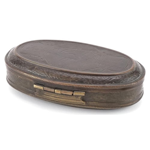 123 - 18th century Flemish oval brass tobacco box with engraved decoration, 14cm wide