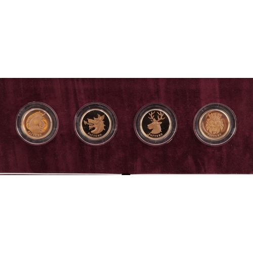 3608 - 2004  Gold Pattern four coin set by The Royal Mint with box and certificate numbered 0375, total wei... 