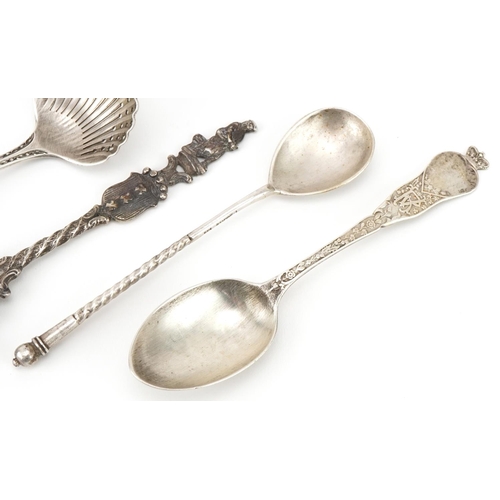 443 - Four antique and later silver spoons including a Russian example and one embossed with Cavaliers, th... 