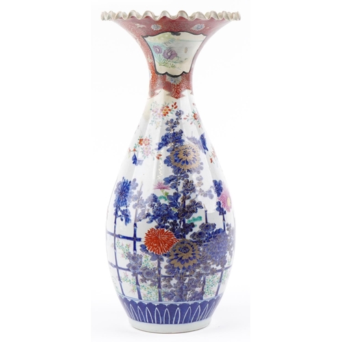 1123 - Large Japanese porcelain vase with frilled rim hand painted with flowers and insects, 55cm high