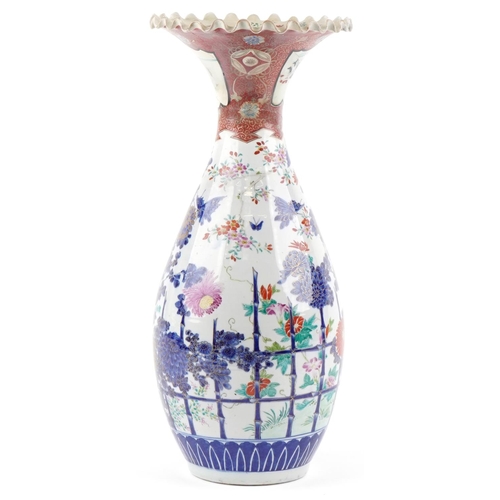 1123 - Large Japanese porcelain vase with frilled rim hand painted with flowers and insects, 55cm high