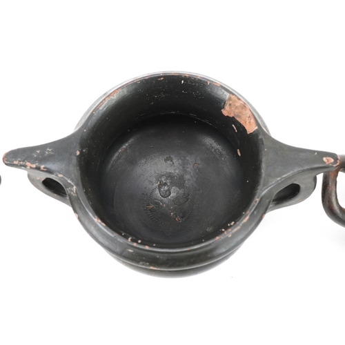 350 - Three Greek black glazed terracotta two handled bowls, circa 400 BC, one with marks to the rim, larg... 