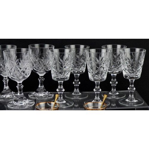 1194 - Two similar cut glass decanters together with a collection of wine and brandy glasses