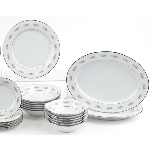 1176 - Noritake part dinner service including platters, dinner plates, side plates and bowls