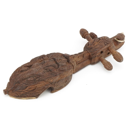 95 - Nepalese Sarangi wooden four string musical instrument carved with an elephant, 33cm in length