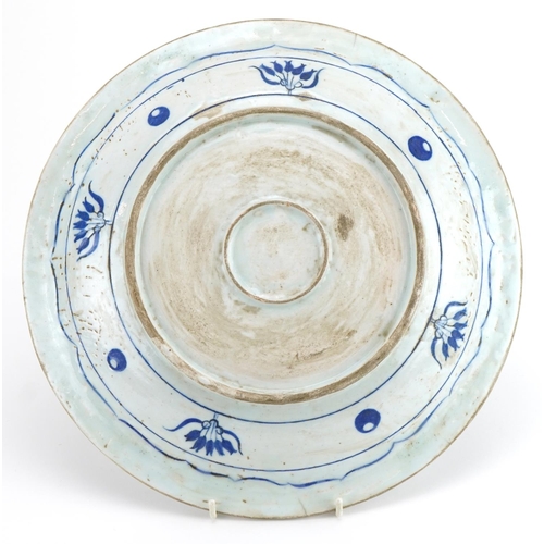 201 - Turkish Iznik pottery plate hand painted with birds and stylised flowers, 31cm in diameter