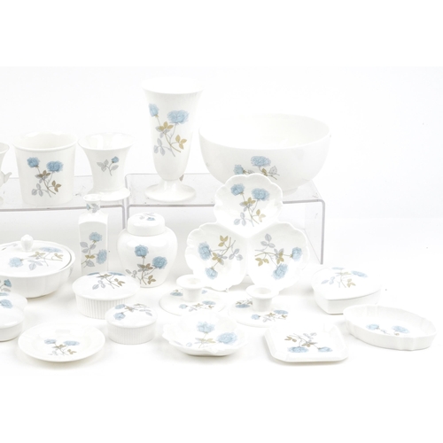 548 - Collection of Wedgwood Ice Rose china including fruit bowl, vases and trinket boxes, the largest 25c... 