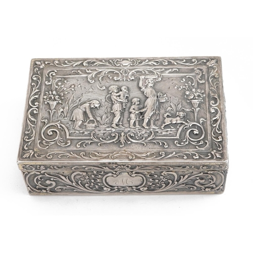 408 - Rectangular Dutch 930 grade silver casket with hinged lid embossed with figures and a dog amongst fl... 