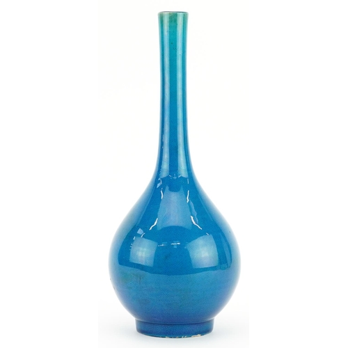 279 - Chinese porcelain long neck bottle vase having a blue glaze, 31cm high