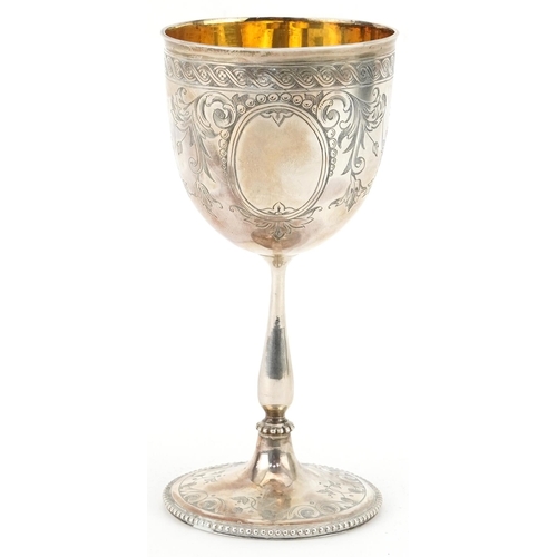 414 - Henry Wilkinson & Co, Victorian silver chalice with gilt interior engraved with swags and flowers, S... 