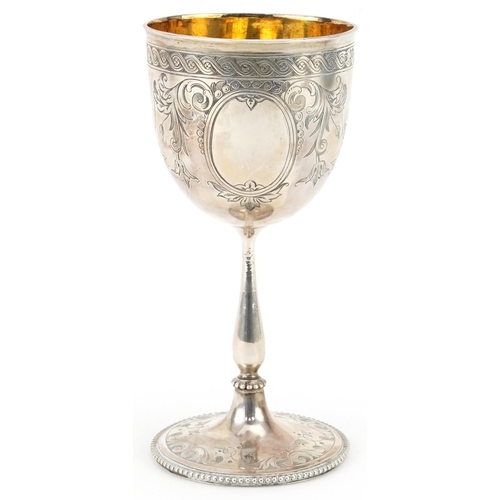 414 - Henry Wilkinson & Co, Victorian silver chalice with gilt interior engraved with swags and flowers, S... 