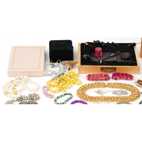 3394 - Small collection of mixed costume jewellery including hatpins, necklaces and bracelets