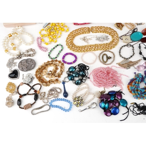 3394 - Small collection of mixed costume jewellery including hatpins, necklaces and bracelets