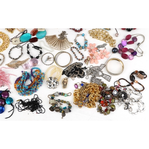 3394 - Small collection of mixed costume jewellery including hatpins, necklaces and bracelets