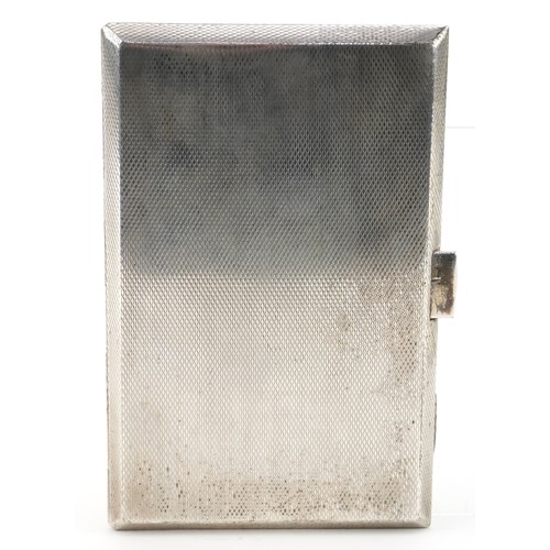 462 - Sterling silver rectangular engine turned cigarette case engraved with a map of India, 12.5cm in len... 