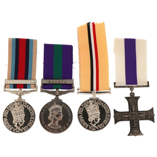 2613 - Four decorative military interest medals with ribbons