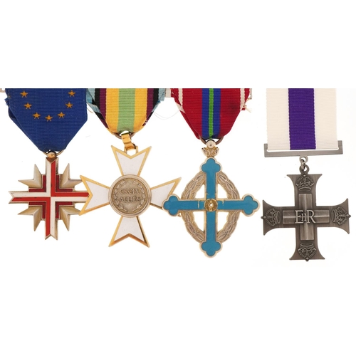 2614 - Four decorative military interest medals with ribbons