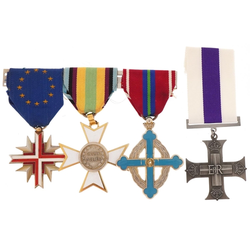 2614 - Four decorative military interest medals with ribbons